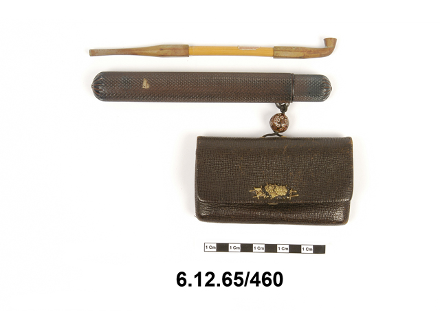 Image of pipe (narcotics & intoxicants: smoking); pipe case; tobacco pouch