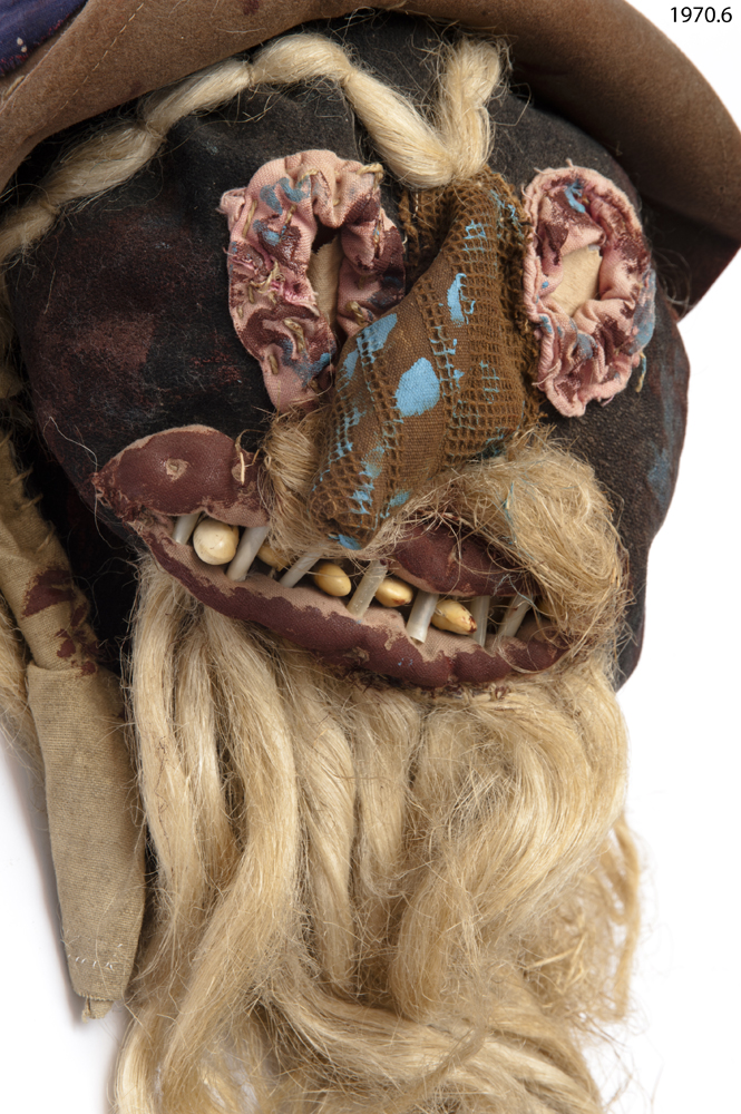 Detail view of face of Horniman Museum object no 1970.6