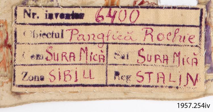 Detail view of label of Horniman Museum object no 1957.254iv