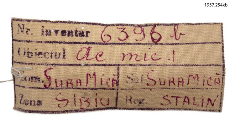 Detail view of label of Horniman Museum object no 1957.254xb