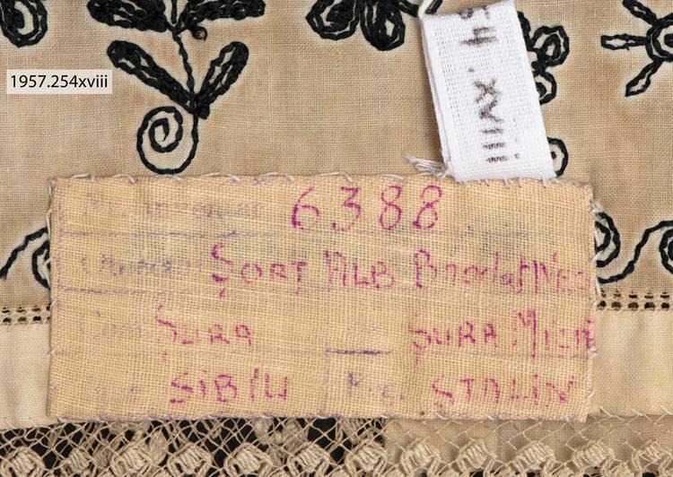 Detail view of label of Horniman Museum object no 1957.254xviii