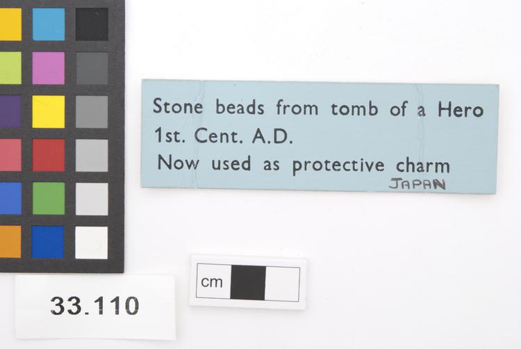 General view of label of Horniman Museum object no 33.110