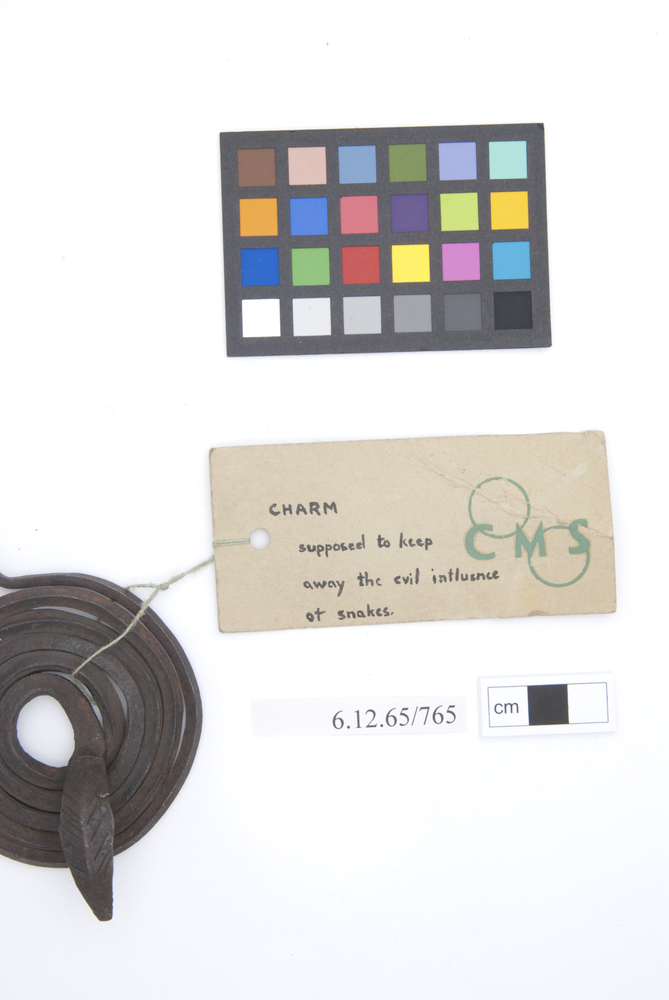 Frontal view of label of Horniman Museum object no 6.12.65/765