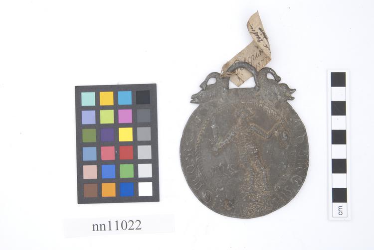 Image of pilgrim token; forgery