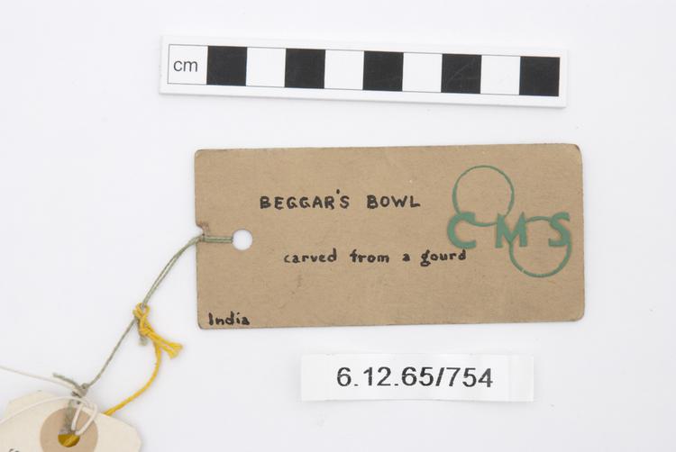 General view of label of Horniman Museum object no 6.12.65/754