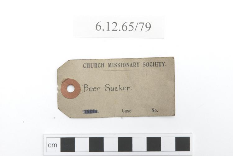 General view of label of Horniman Museum object no 6.12.65/79