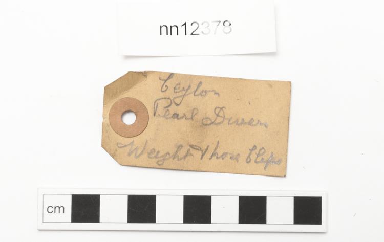 General view of label of Horniman Museum object no nn12378