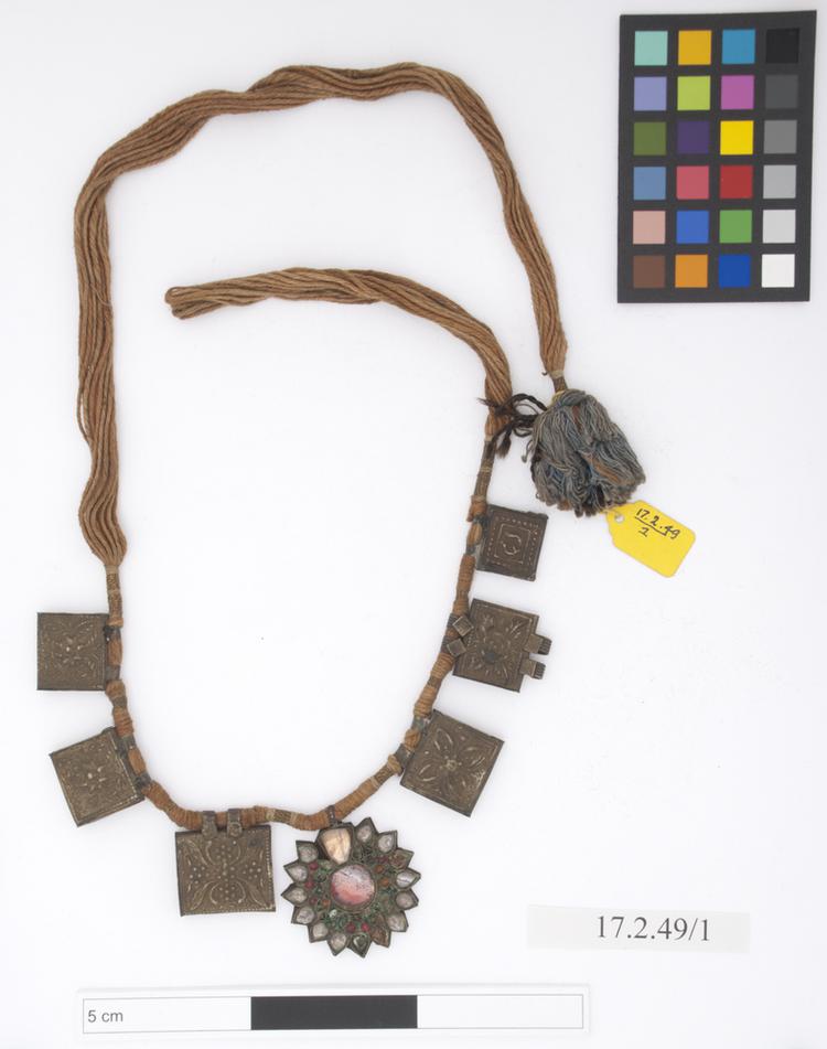 necklace (neck ornament (personal adornment)); amulet