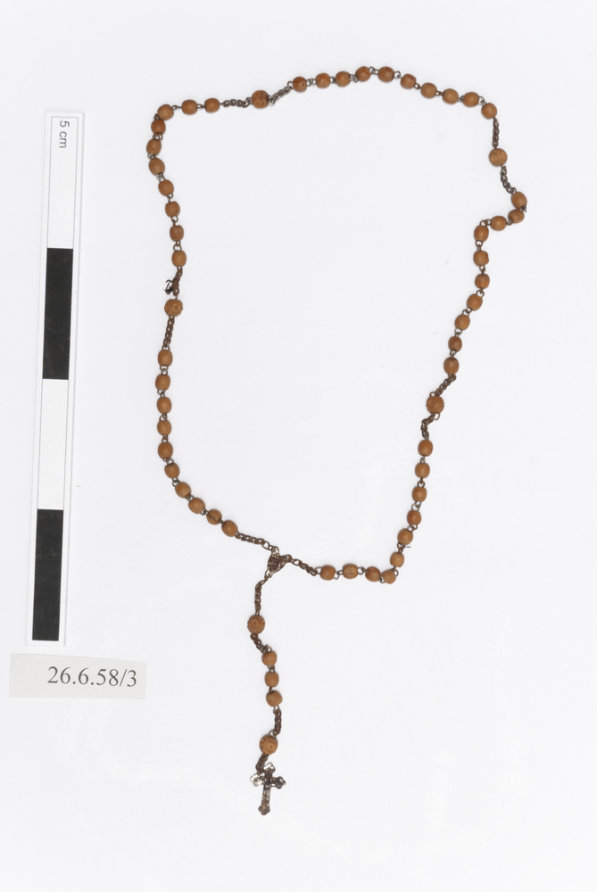 Image of rosary; votive offering