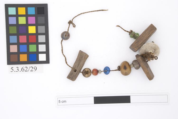 Image of protective charm; amulet; necklace (neck ornament (personal adornment))