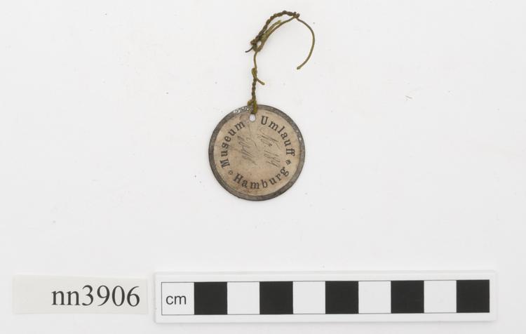 Frontal view of label of Horniman Museum object no nn3906