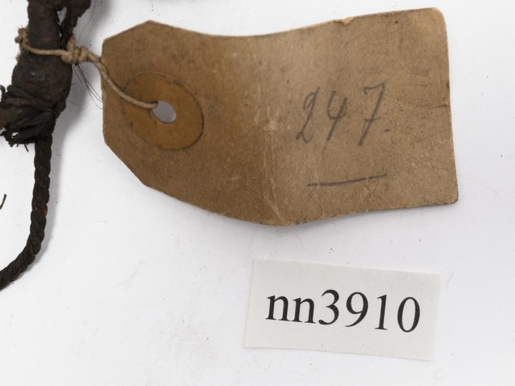 General view of label of Horniman Museum object no nn3910