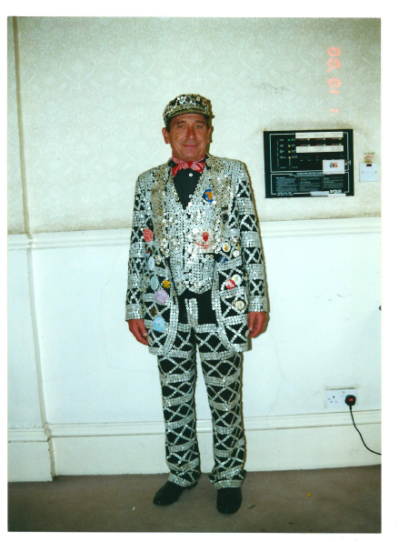 Fred Booth wearing his pearly king suit, Horniman object no 2012.11, from the front