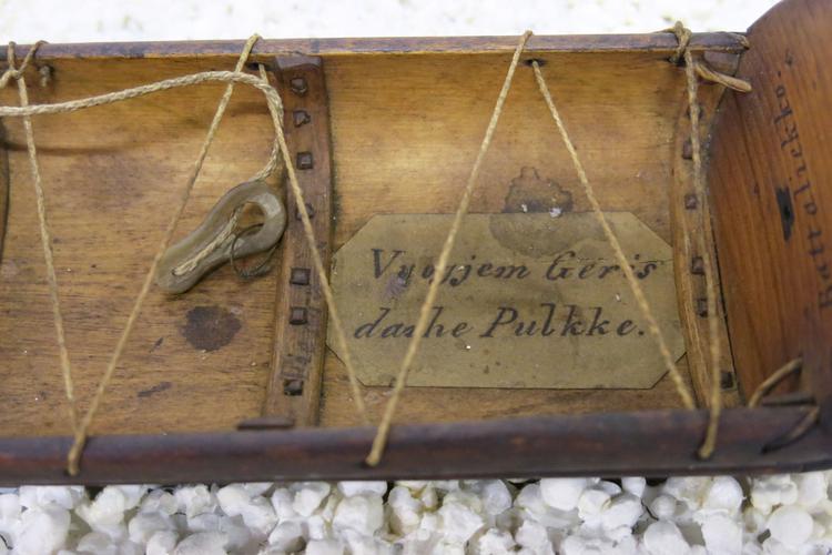 General view of the lable on the inside of the sled  of Horniman Museum object no 32.53