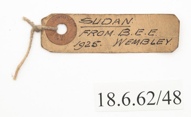 General view of label of Horniman Museum object no 18.6.62/48