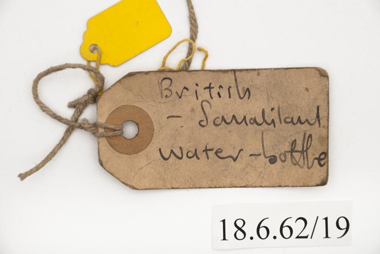 General view of label of Horniman Museum object no 18.6.62/19