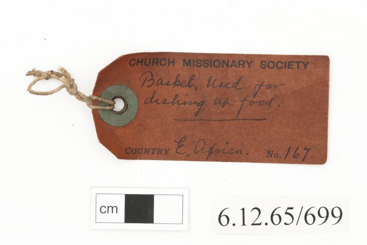 General view of label of Horniman Museum object no 6.12.65/699