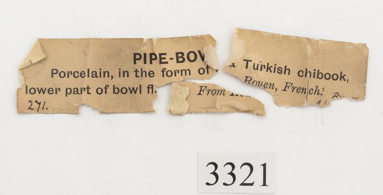 General view of label of Horniman Museum object no 3321