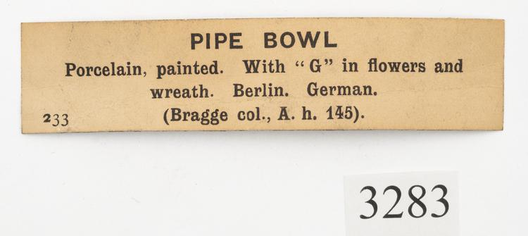 General view of label of Horniman Museum object no 3283