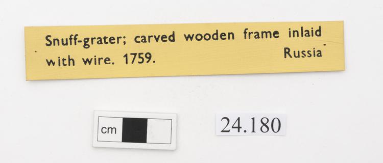General view of label of Horniman Museum object no 24.180