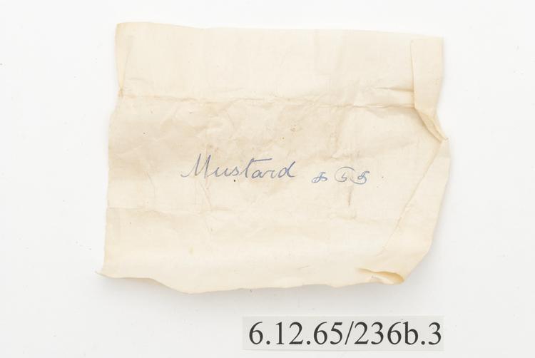 General view of label of Horniman Museum object no 6.12.65/236b.3