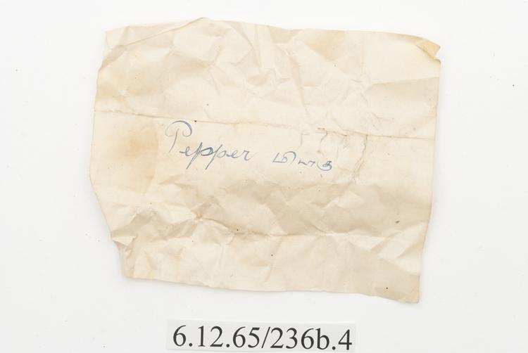 General view of label of Horniman Museum object no 6.12.65/236b.4