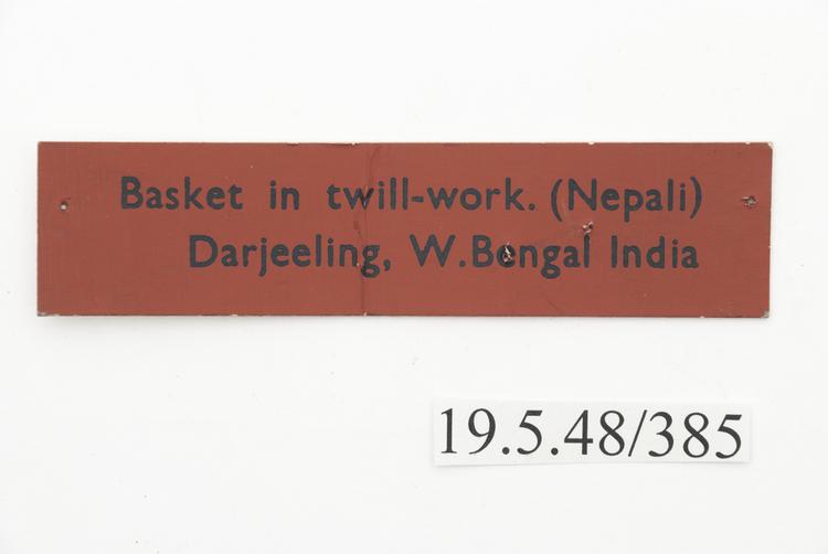 General view of label of Horniman Museum object no 19.5.48/385