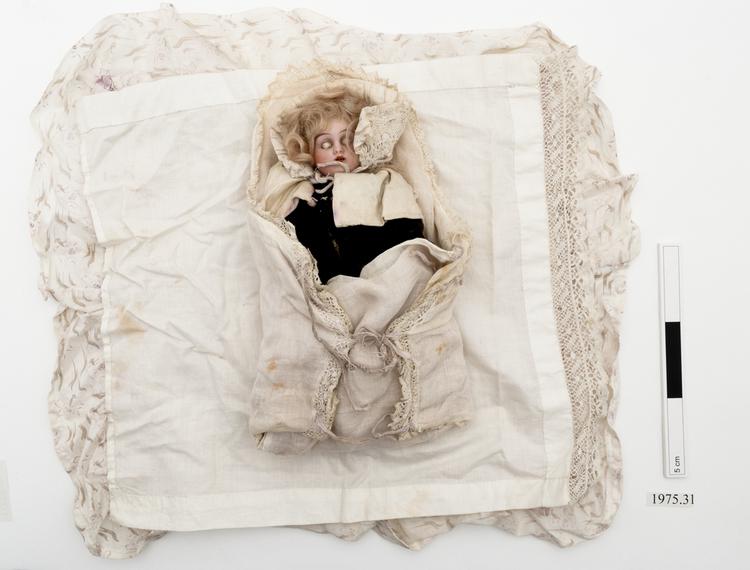 doll (pastimes: toys); bedding