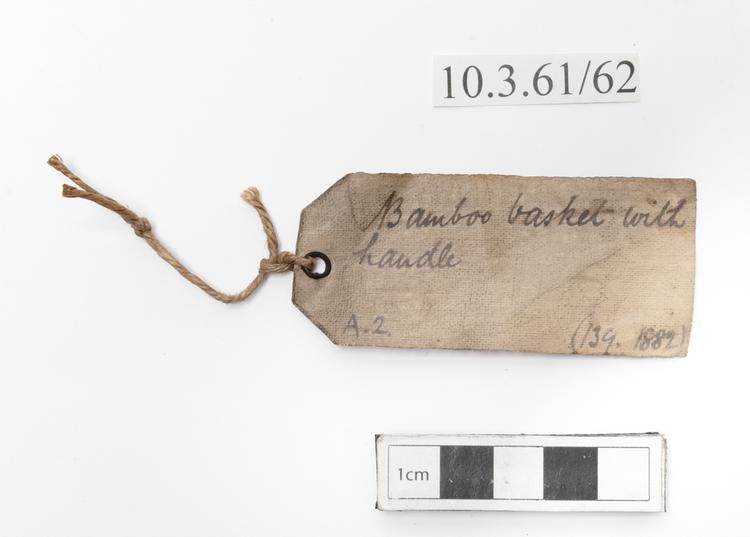General view of label of Horniman Museum object no 10.3.61/62