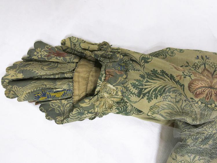 Detail view of right sleeve of Horniman Museum object no nn4914