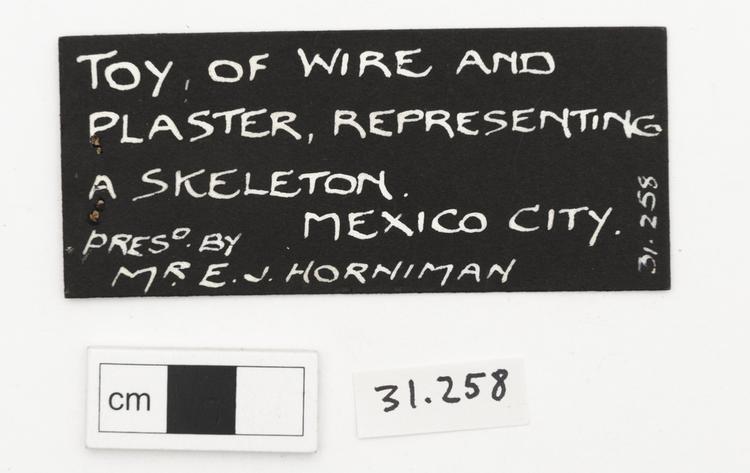 General view of label of Horniman Museum object no 31.258