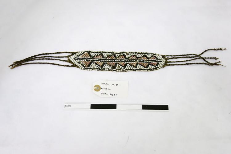 Image of armlet (arm ornament); currency unit