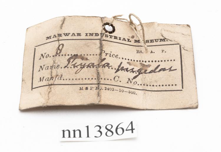 General view of label of Horniman Museum object no nn13864