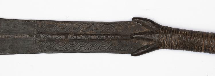 Detail view of hilt of Horniman Museum object no 13.3.61/21