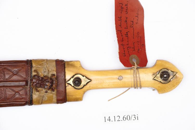 Detail view of hilt of Horniman Museum object no 14.12.60/3i