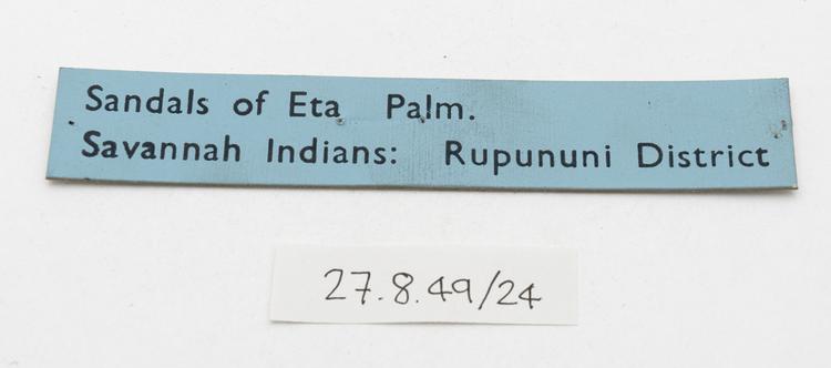General view of label of Horniman Museum object no 27.8.49/24a