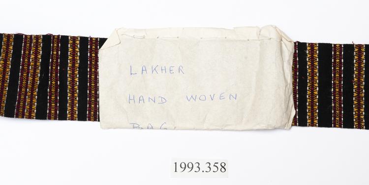 General view of label of Horniman Museum object no 1993.358