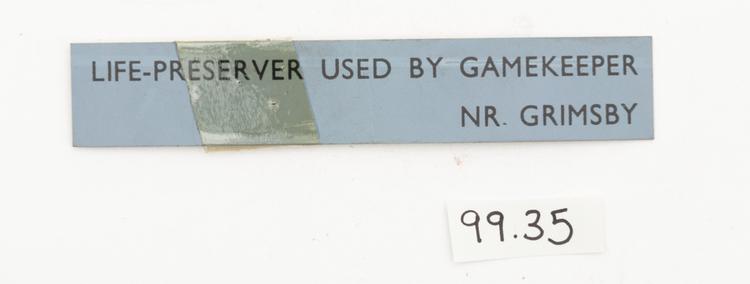 General view of label of Horniman Museum object no 99.35