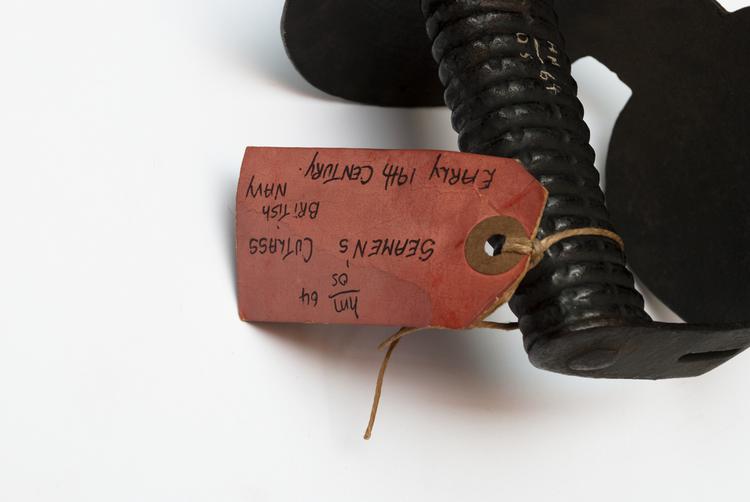 Detail view of label of Horniman Museum object no hmos64