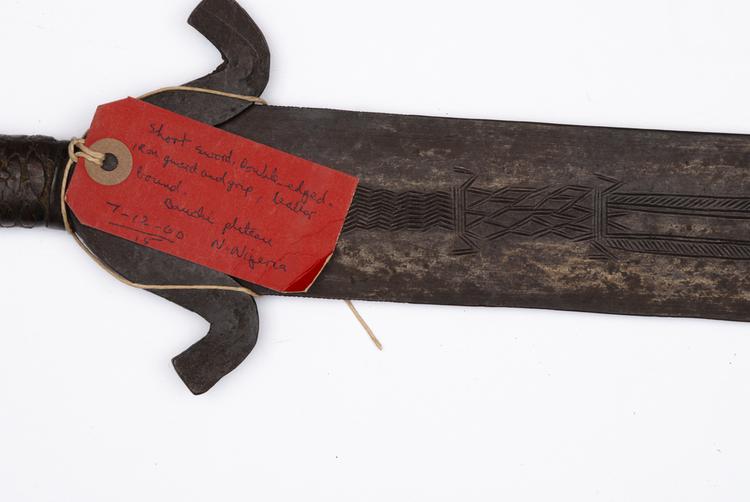 General view of label of Horniman Museum object no 7.12.60/15