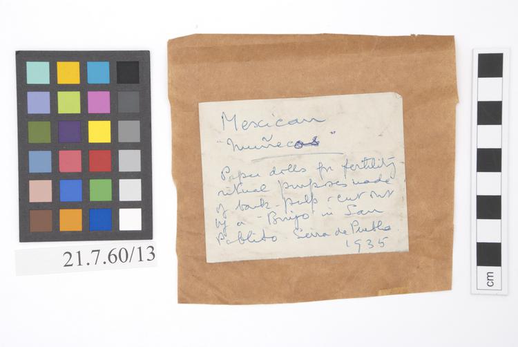 General view of label of Horniman Museum object no 21.7.60/13e