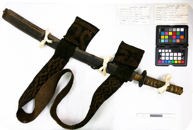 sword (weapons: edged); sword sheath (sheath (weapons: accessories)); baldric