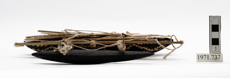 Image of dugout with single outriggers (dugout canoe model)