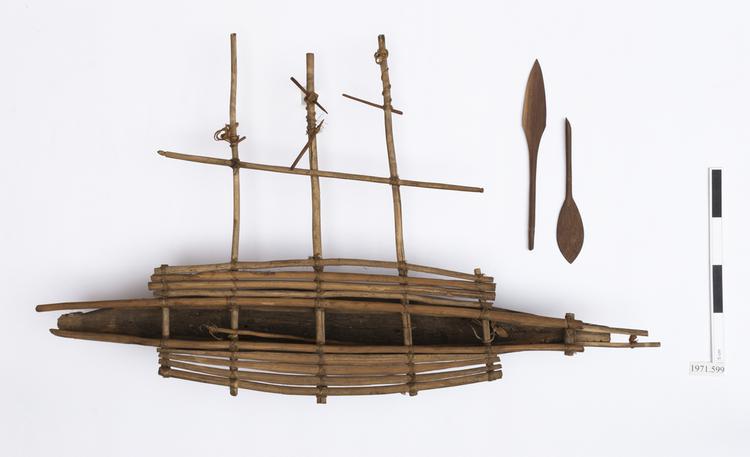 dugout with single outriggers (dugout canoe model); canoe paddles