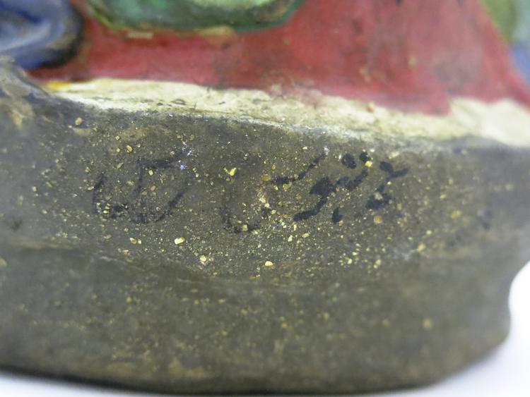 Detail view of inscription on base of Horniman Museum object no nn4111