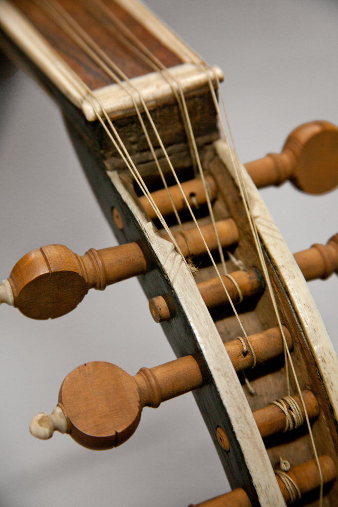 Detail view of 2 tuning pegs  of Horniman Museum object no M24.8.56/95