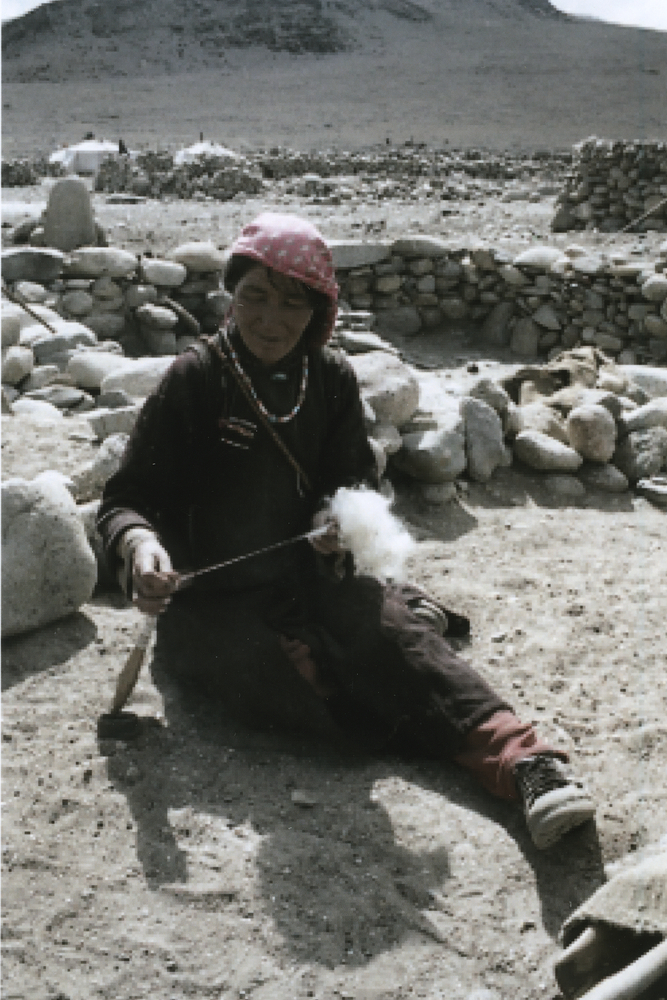 Photograph of a woman spinning, Kharnak