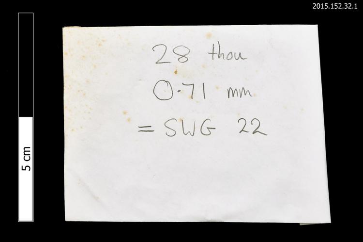 General view of envelope for spare string with identification of Horniman Museum object no 2015.152.32.1