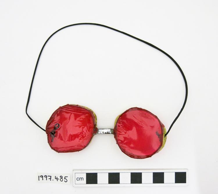spectacles; votive offering