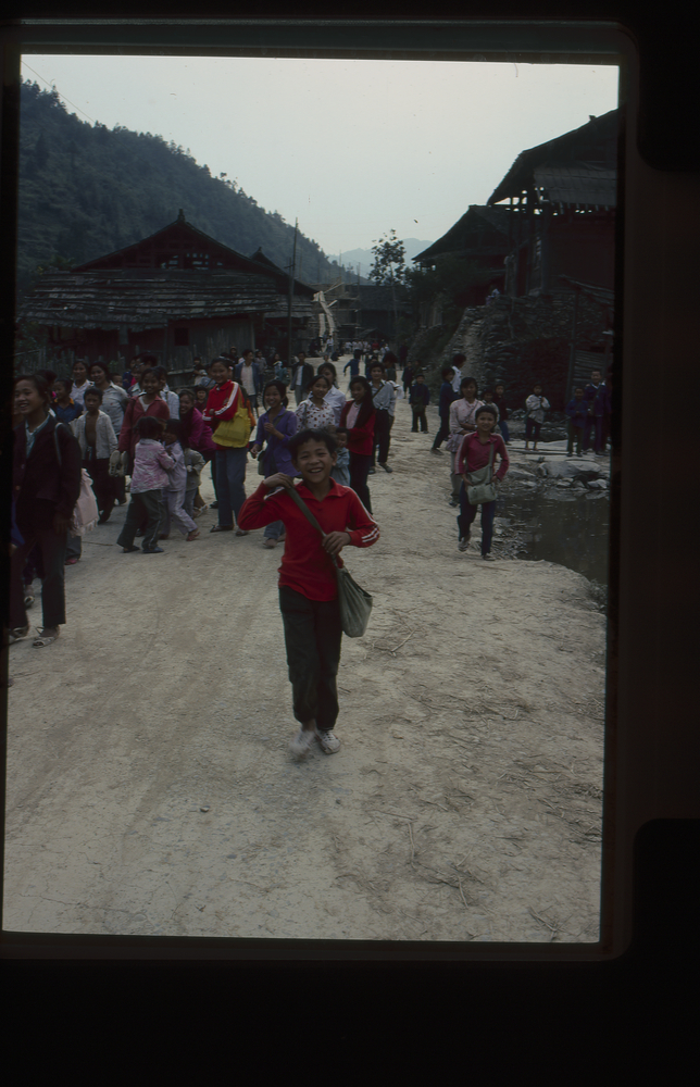 Image of 35mm slide: Girl in the street